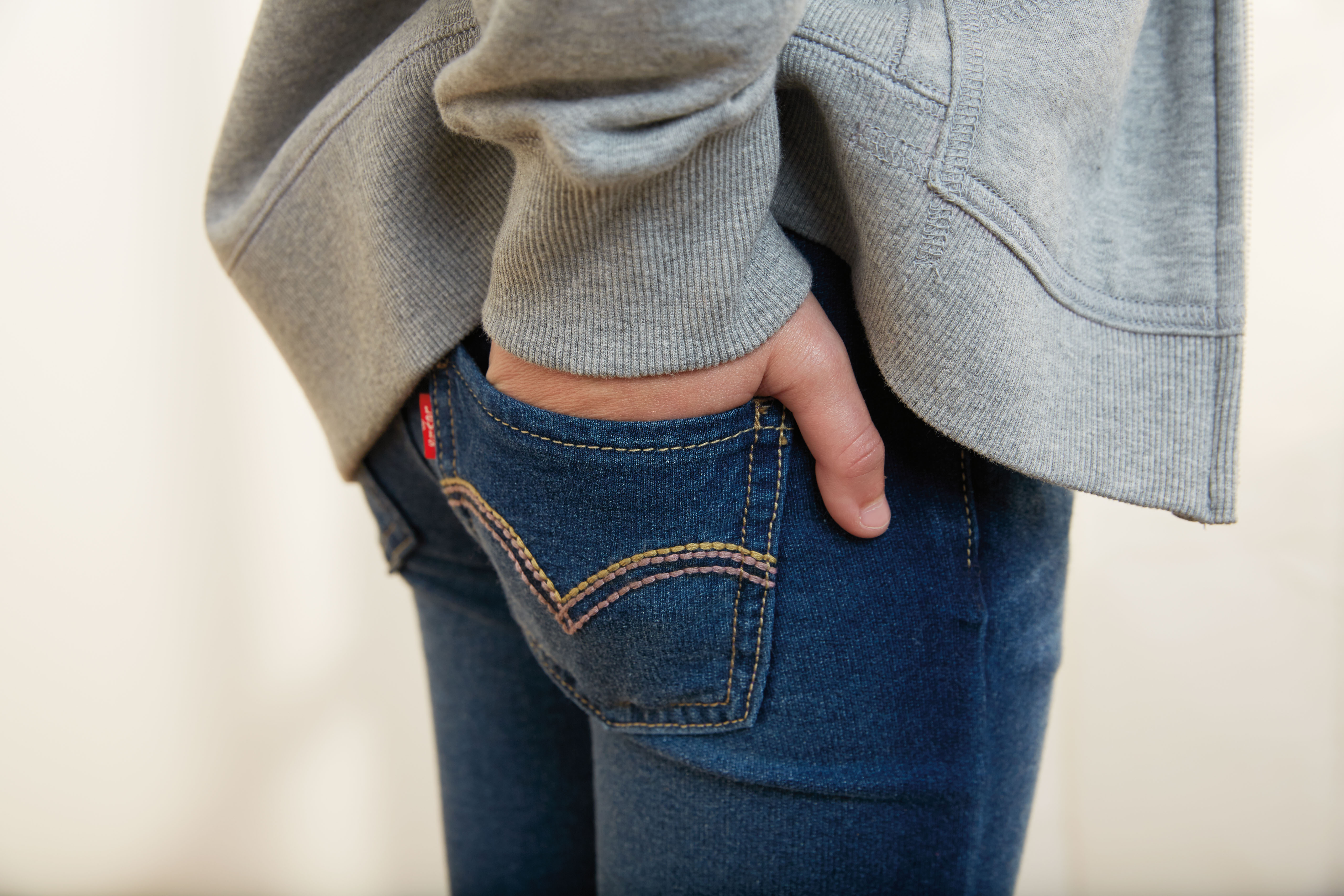Why did Levi Strauss invent blue jeans?