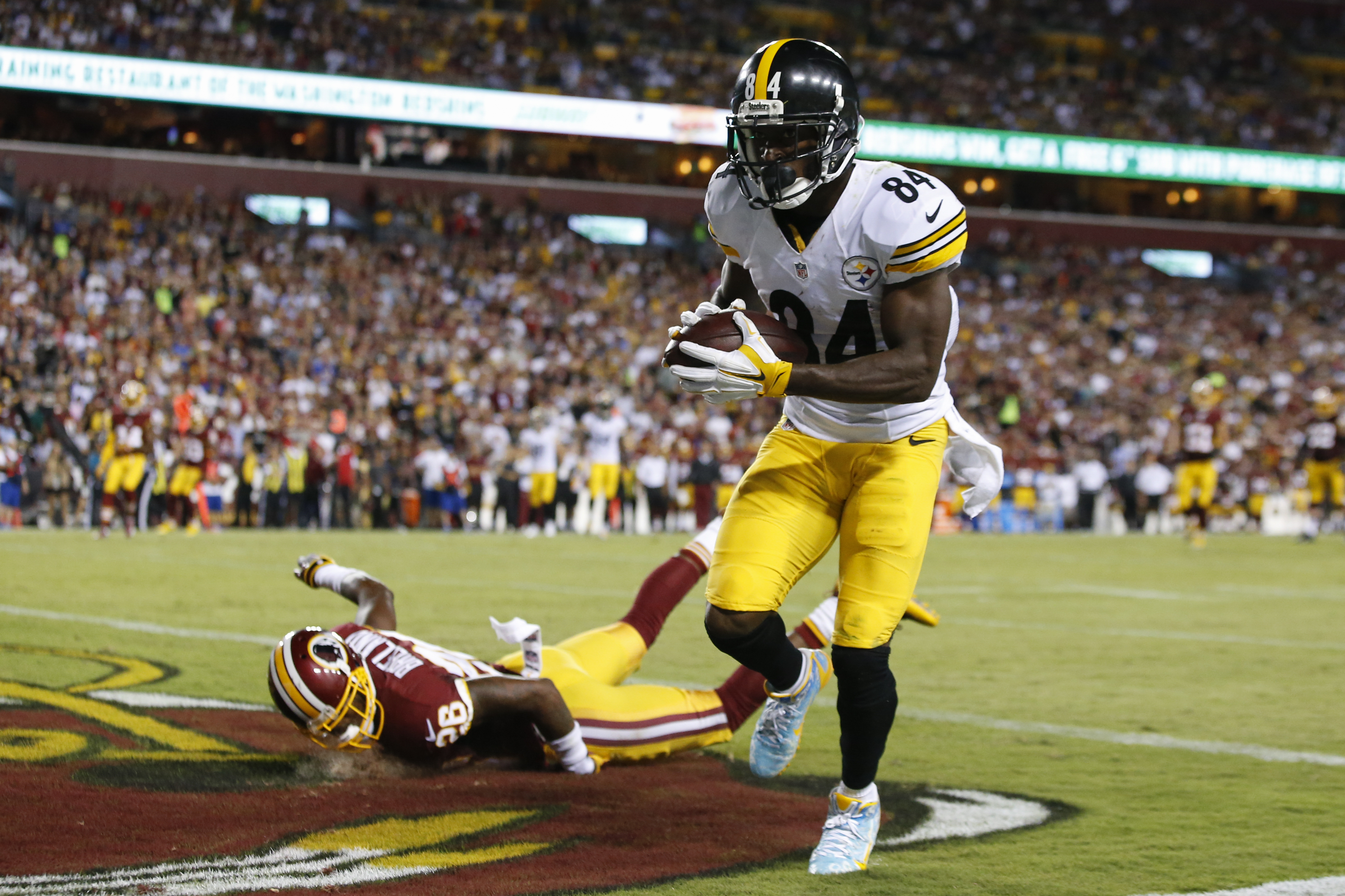 Josh Norman stays on his side, rarely covers Antonio Brown